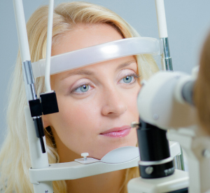 Woman getting an eye exam