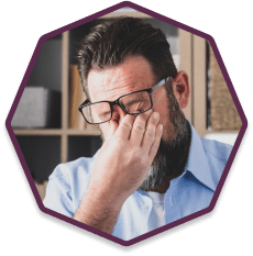 Man suffering from dry eye, rubbing his eyes Man suffering from dry eye, rubbing his eyes