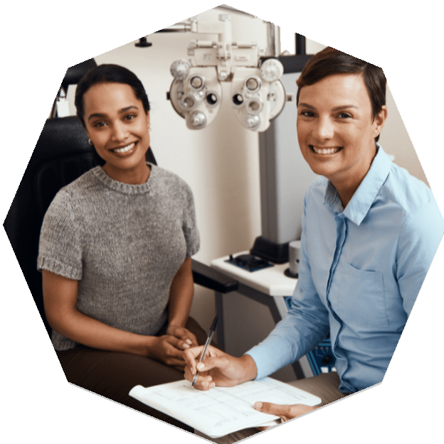 Patient filling out forms at Insight Eyecare