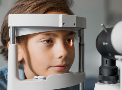 Boy getting a pediatric eye exam Boy getting a pediatric eye exam