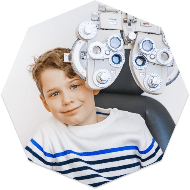 Child getting a pediatric eye exam Child getting a pediatric eye exam