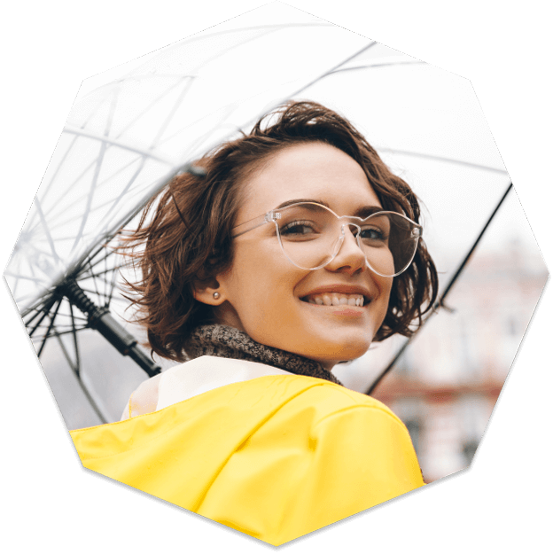 Woman wearing designer frames from Insight Woman wearing designer frames from Insight